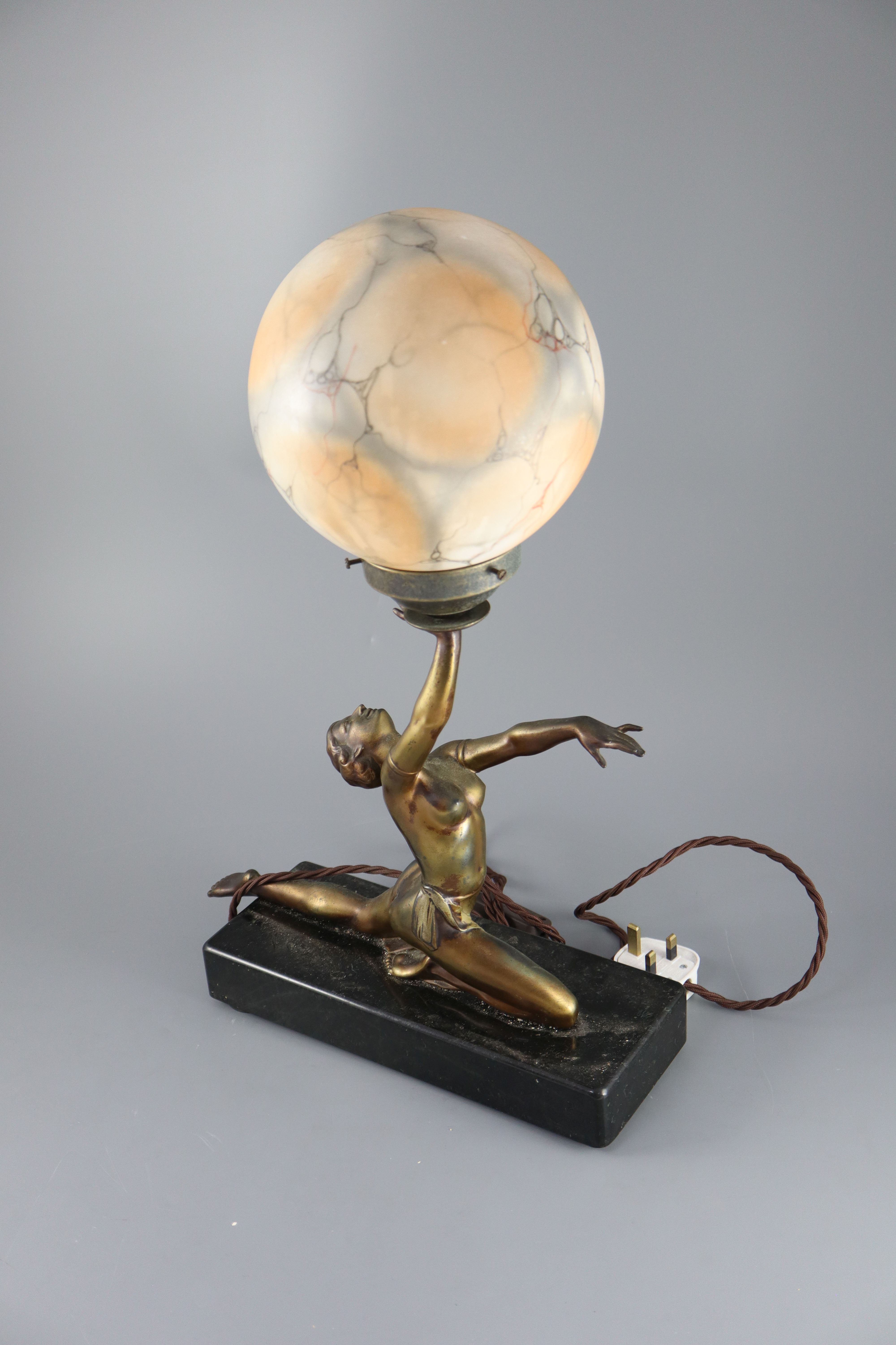 A French Art Deco bronzed spelter table lamp, height 21in.
